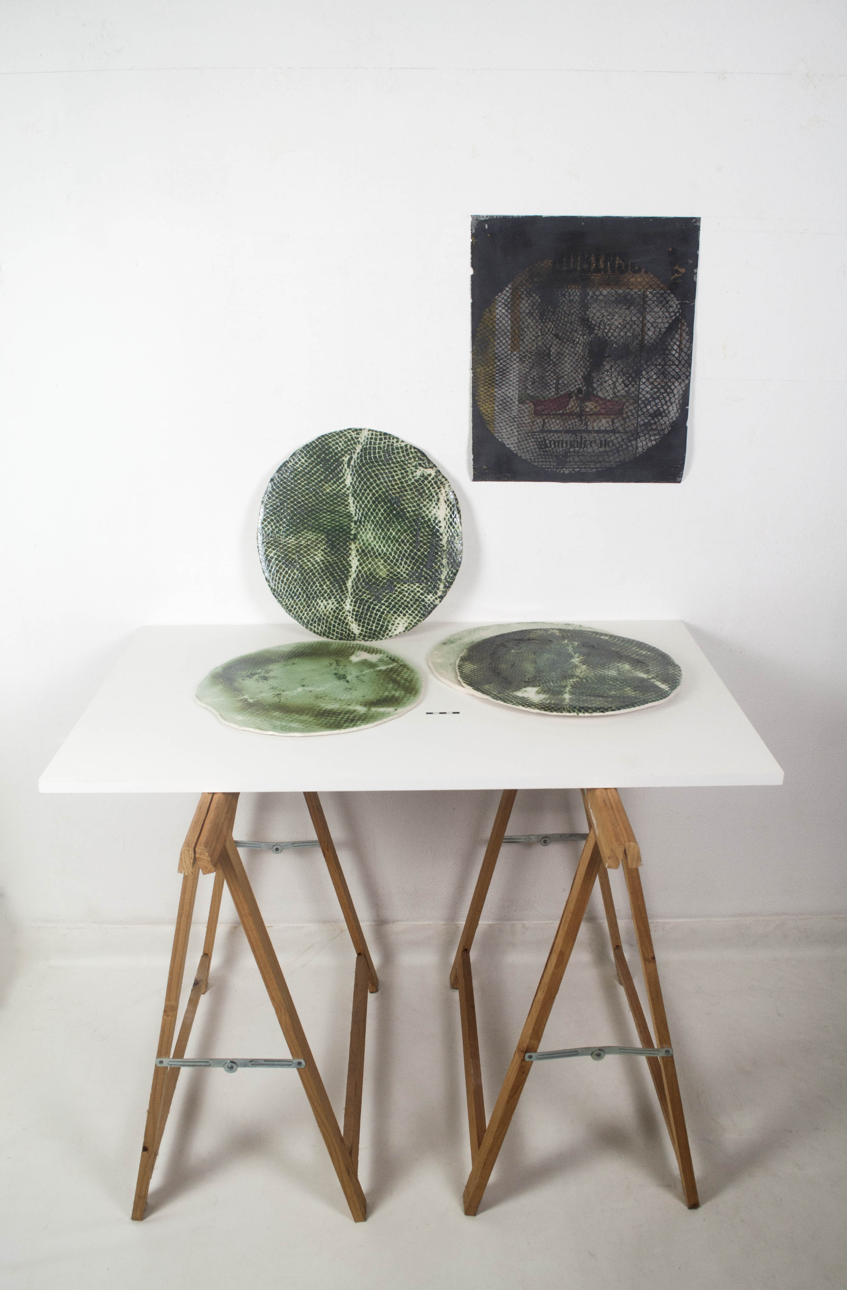 MEDAGLIONI A PELLE VERDE - Artwork