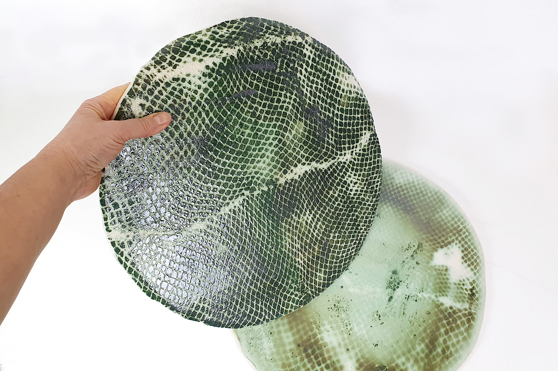 MEDAGLIONI A PELLE VERDE - Artwork