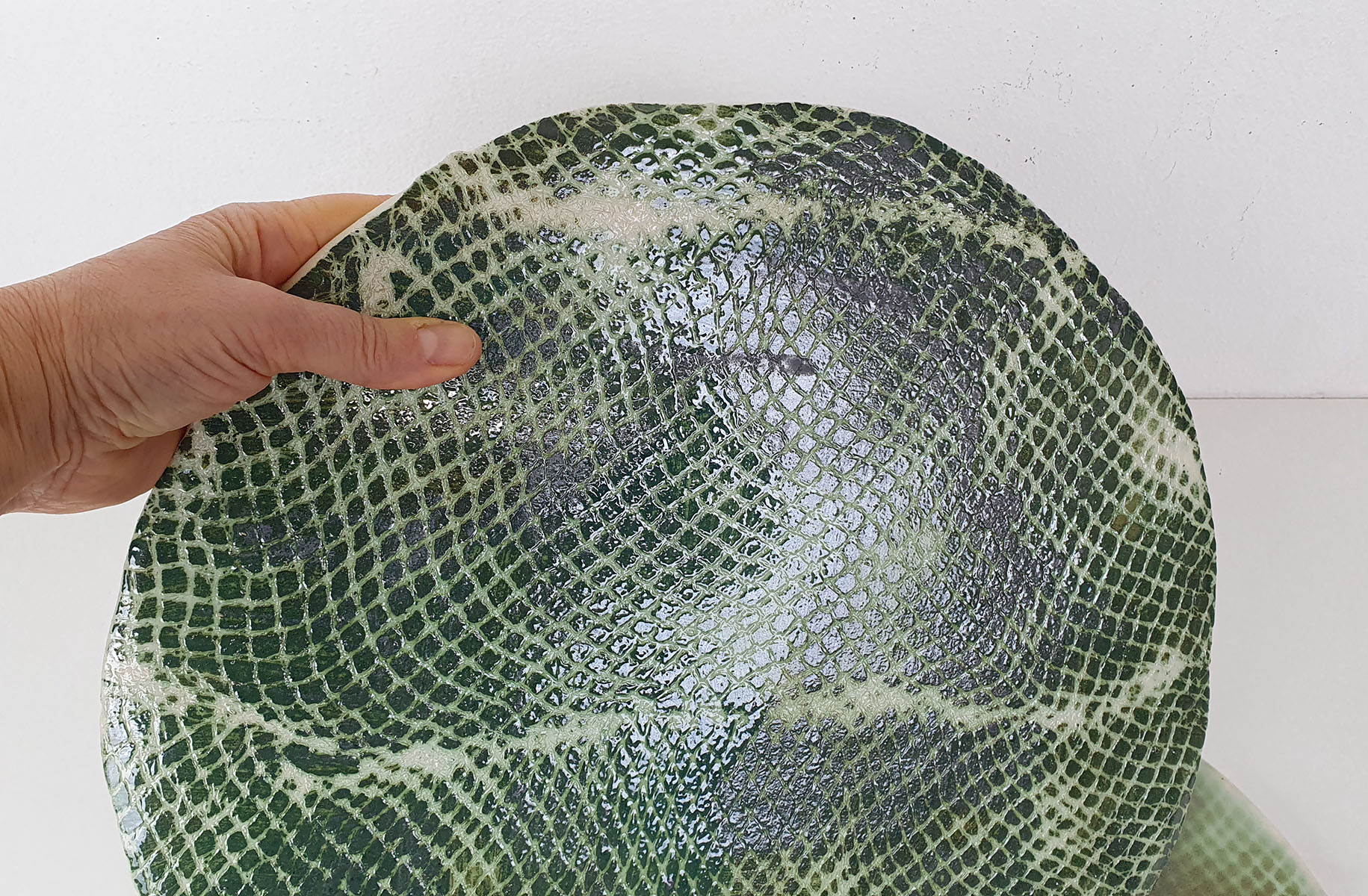 MEDAGLIONI A PELLE VERDE - Artwork